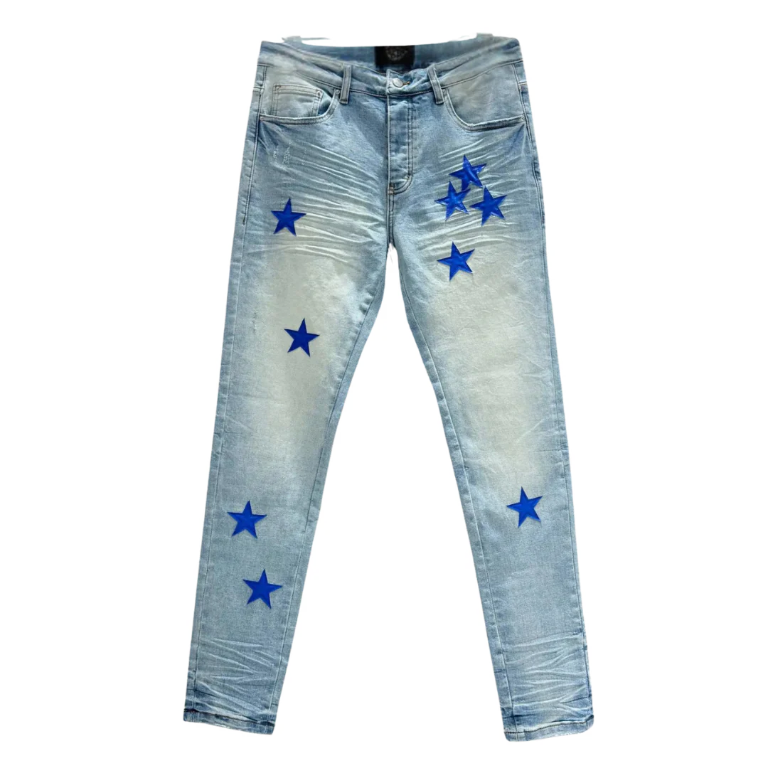 Amiri Blue Stars Print Ripped Jeans